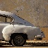 © Susan Gendron PhotoID# 13713374: Car and Yellow Wall, Havana