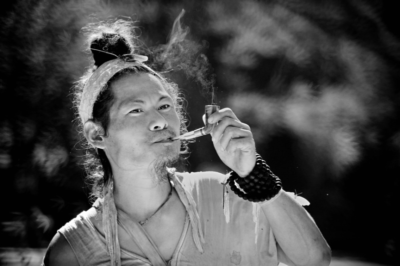 Smoking the pipe - ID: 14010857 © Kyaw Kyaw Winn