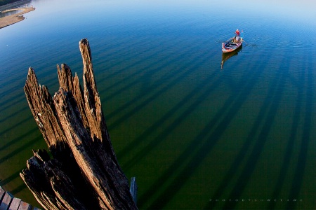 SHADOWS OVER THE WATER