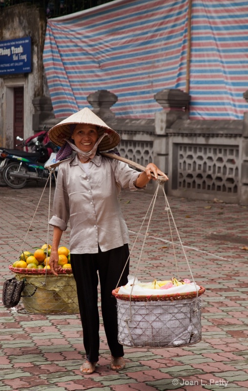 Woman in Vietnam Carrying Load