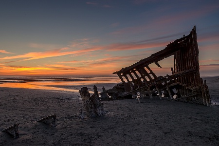 Shipwreck At Sunset
