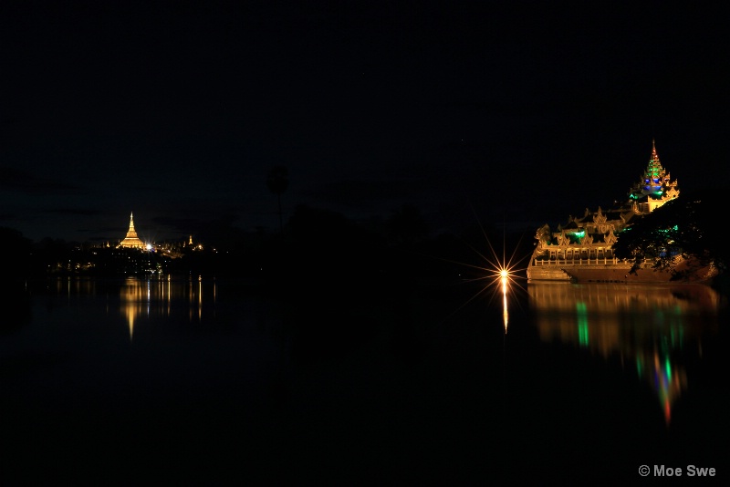 Night scence of shwedagon form lakeside