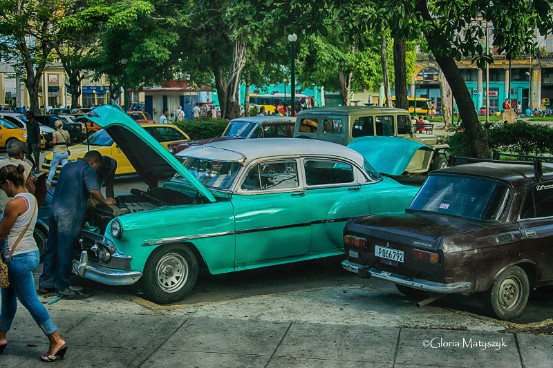 Working on a car in Old Havana, Cuba