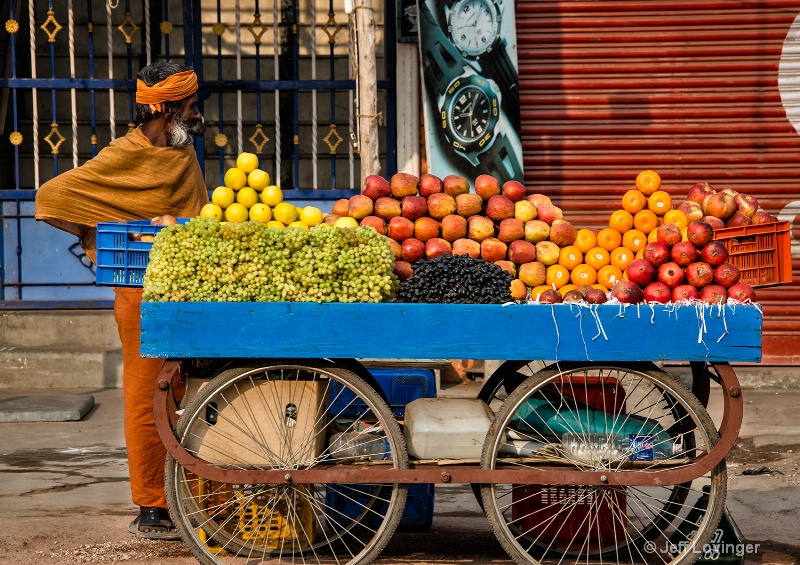 Sadhu and Fruit Cart, Tiruvannamalai, India    - ID: 14271274 © Jeff Lovinger