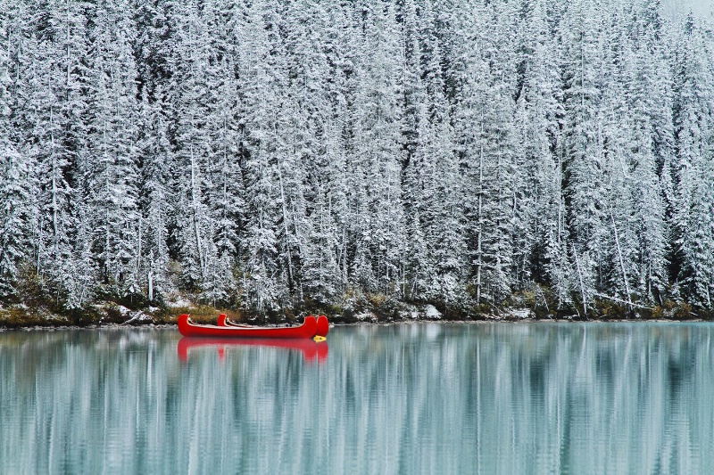 First snow and the red canoes 