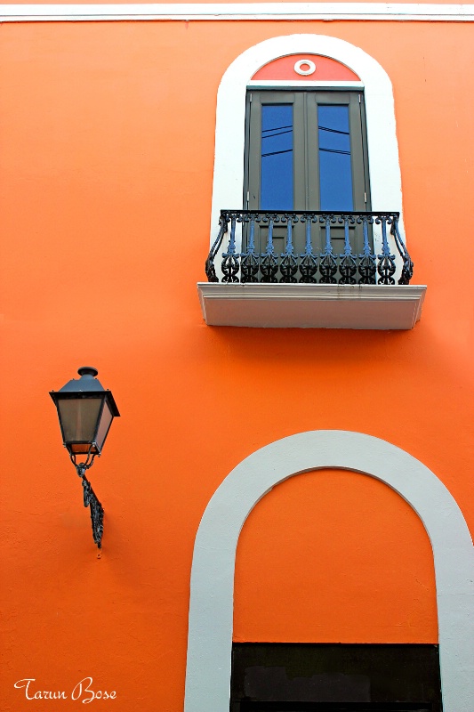 Lamp post, terrace & curved door.