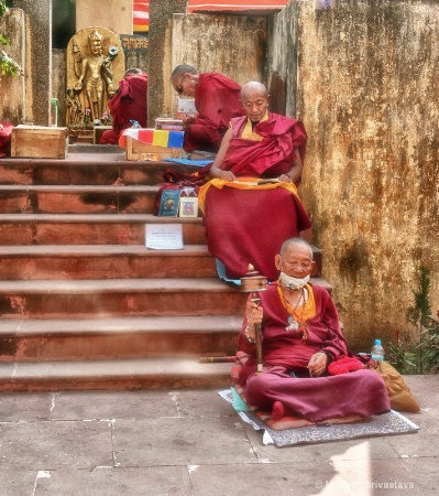 Budhist Monks At Prayer