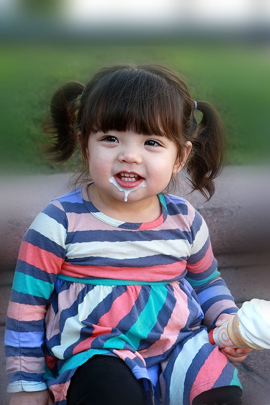 Enjoying her ice cream