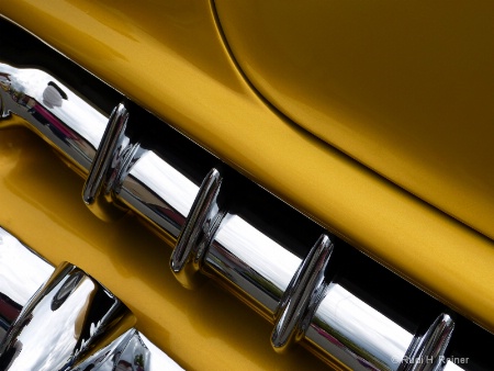 Gold & chrome bumper abstract
