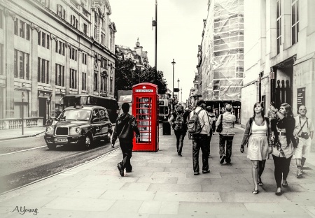 TOURISTS AND THE RED TELEPHONE BOX..