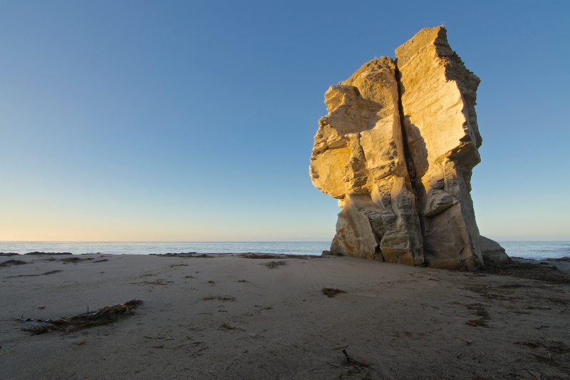 Sunrise on a beach rock, Santa Cruz, CA