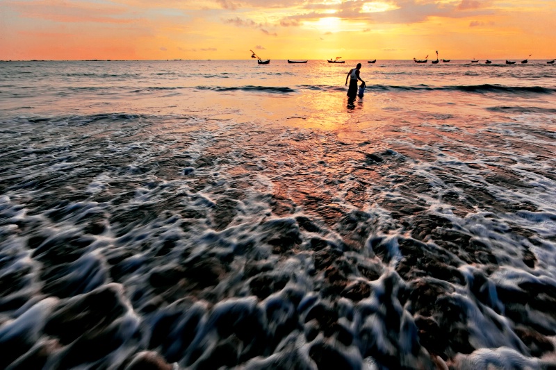 Man and Waves of the Sea