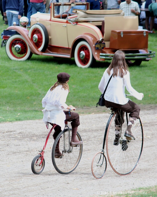 two girls riddinga a bike