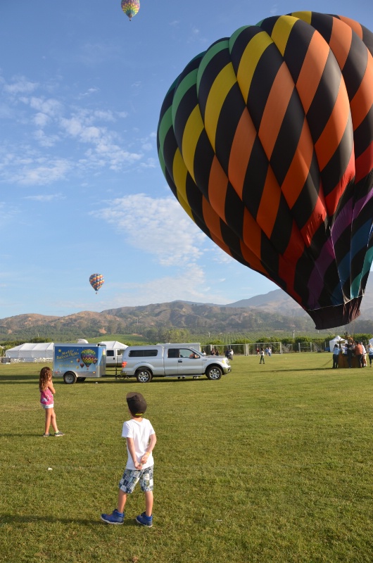 Kids Spying on Balloons - ID: 14603529 © John W. Davis