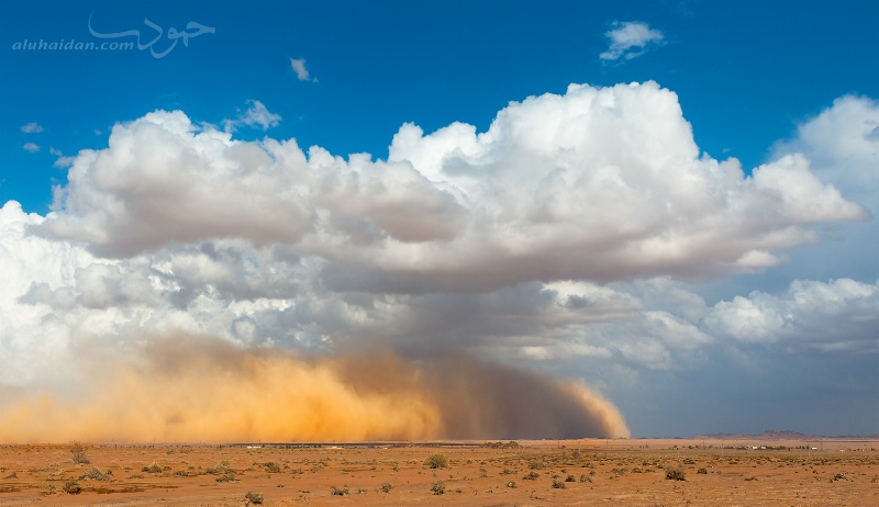 a Cloud sweeping a Dust-cloud