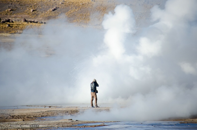 Photographer in the geysers