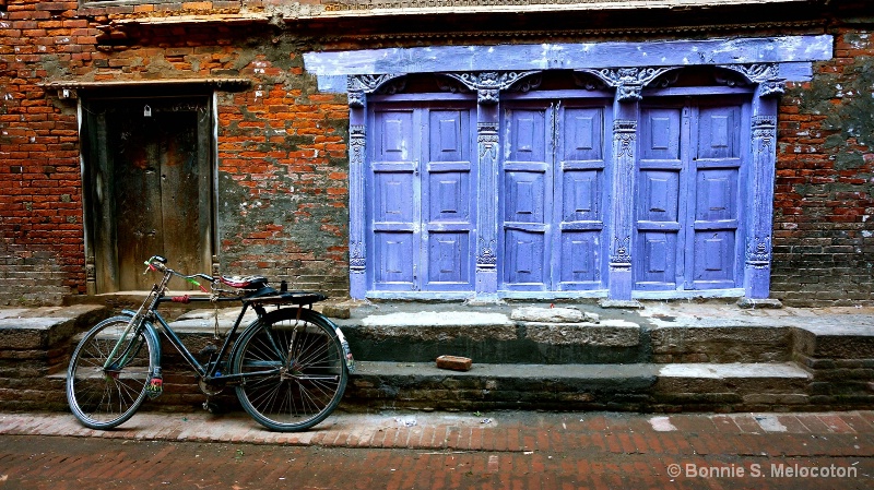 A Bike & Purple Doors