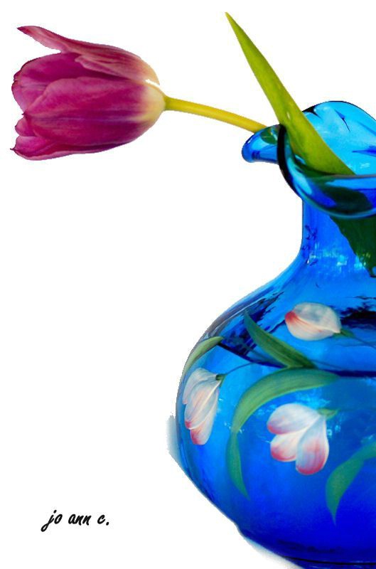 Tulips in a Blue Vase.....