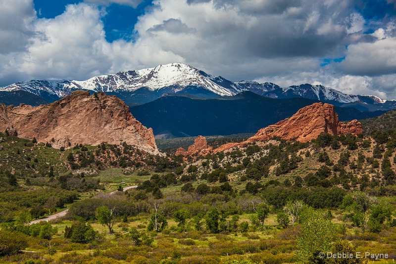 PIKES PEAK SURROUNDED BY GARDEN OF THE GODS