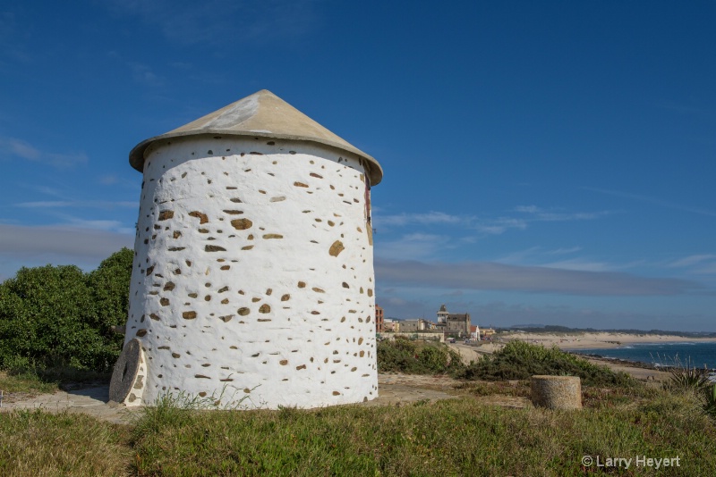 Old Windmill on Apulia Beach, Portugal