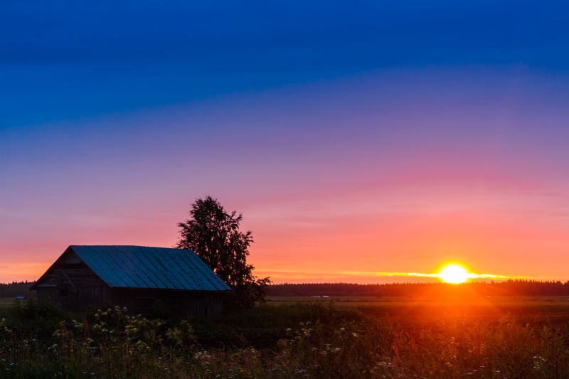Beautiful Sunset And A Barn House