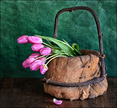 A Basket Of Pink Tulips