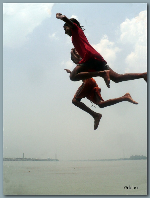 Brave jumping in the Ganga river...