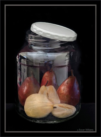 Ajar with a pair of pared pears