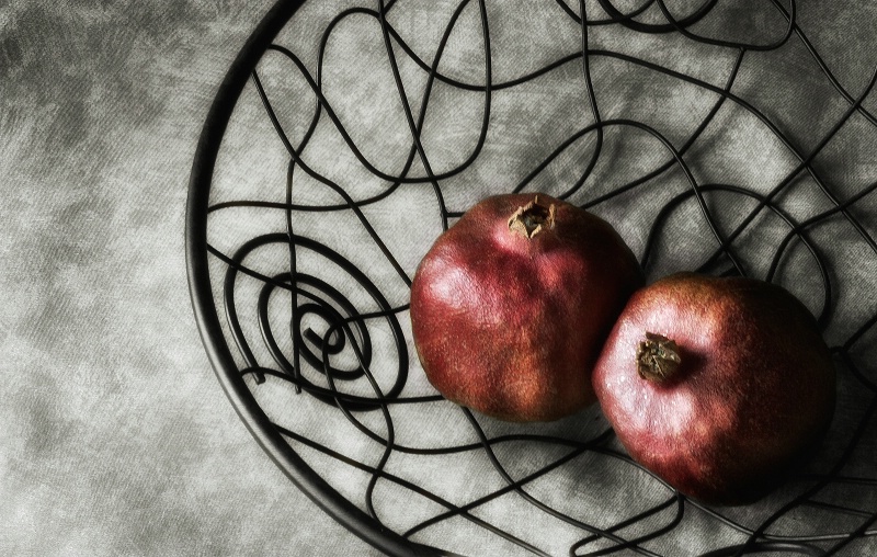 Pomegranates in Wire Basket