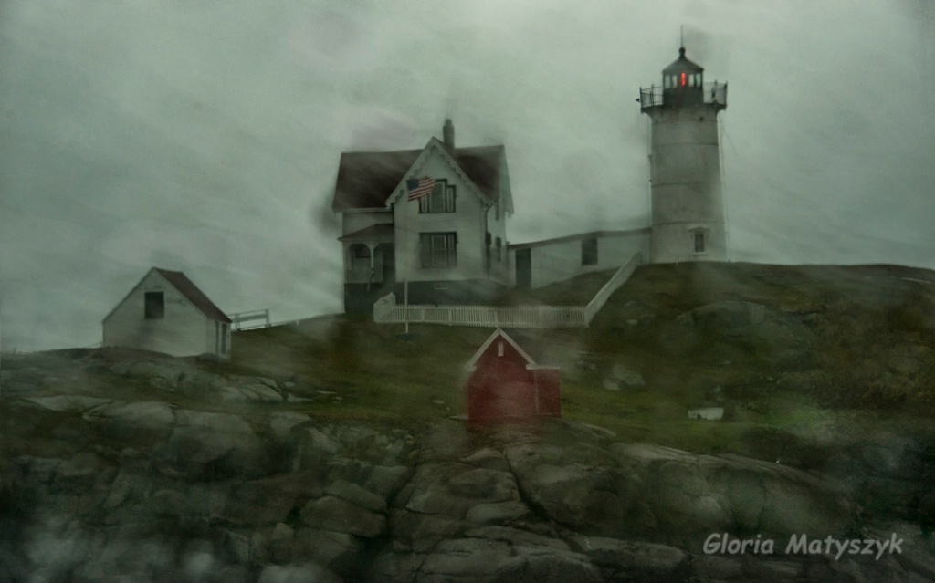 Nubble Lighthouse in the rain.Cape Neddick, Maine - ID: 15248372 © Gloria Matyszyk