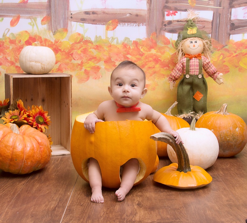 *Baby in a Pumpking*