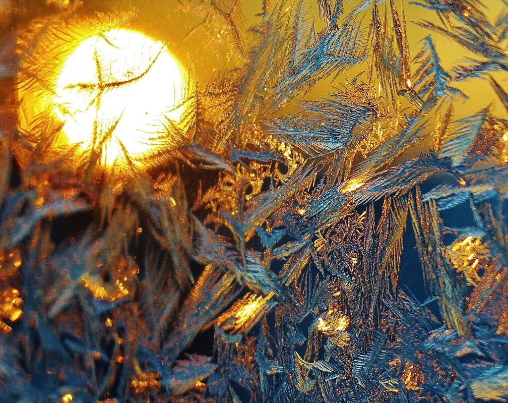 Ice Crystals and Rising Sun