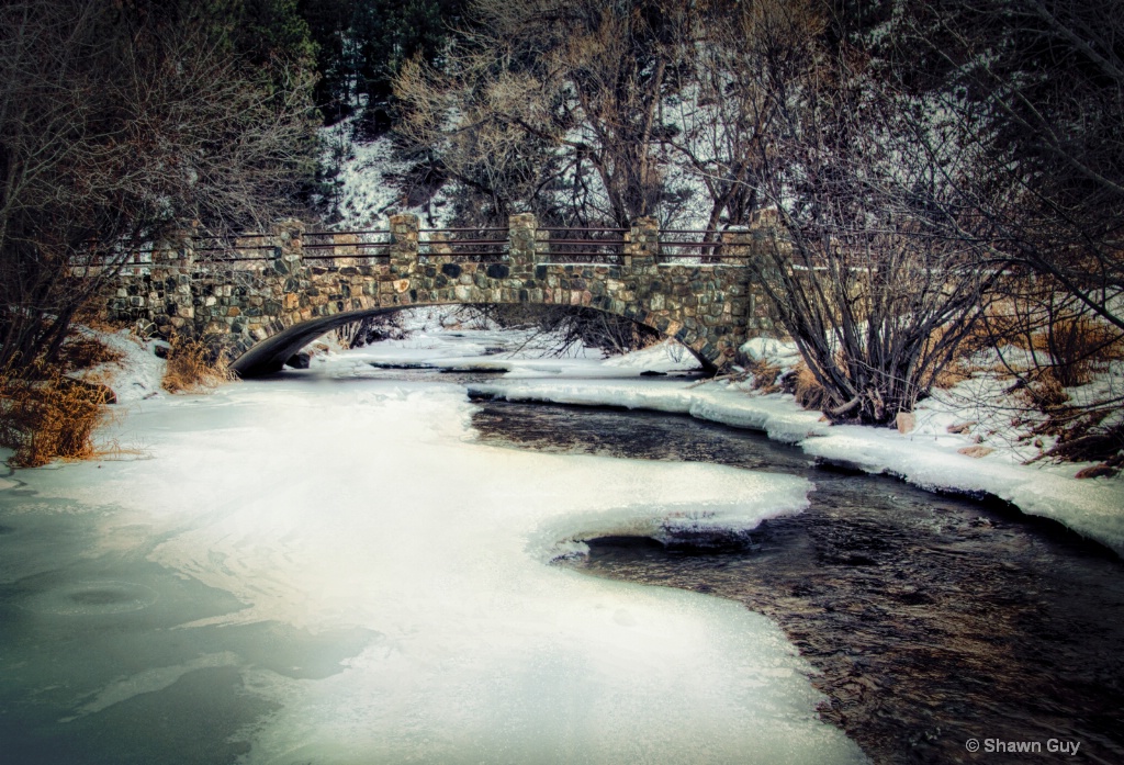 Bridge over icy stream
