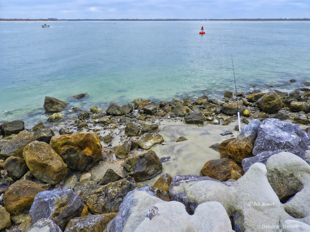 Stones Sand Water and Boats