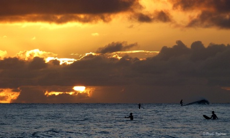 Sunset surfers, Kauai