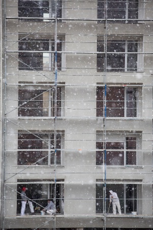 Men at Work on a Snowy Spring Day