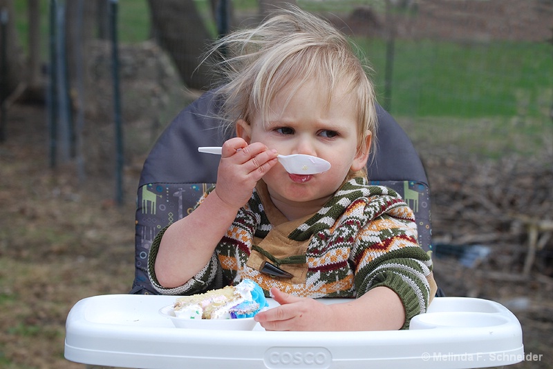 Two-year-old with a spoon