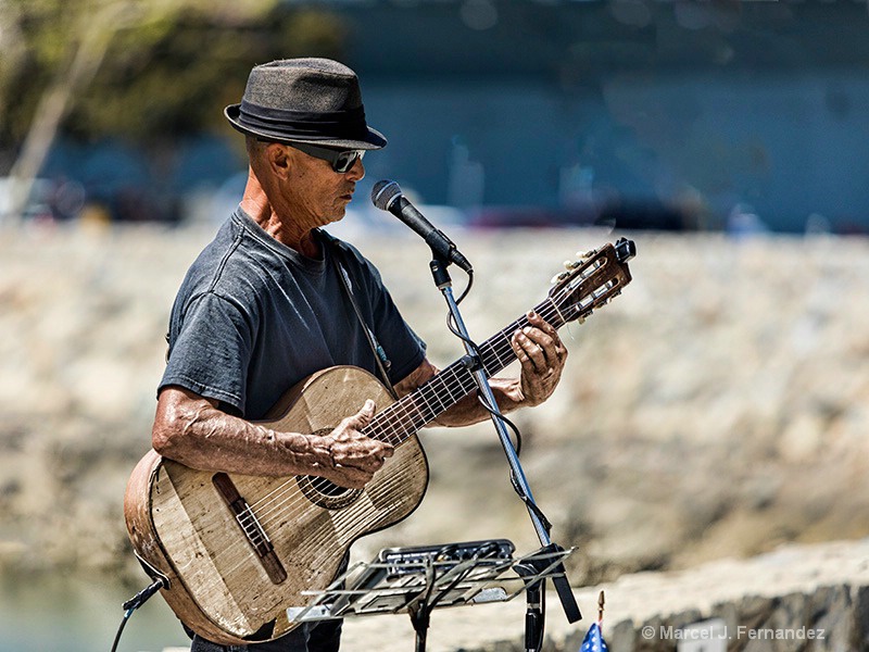 Playing The Old Guitar