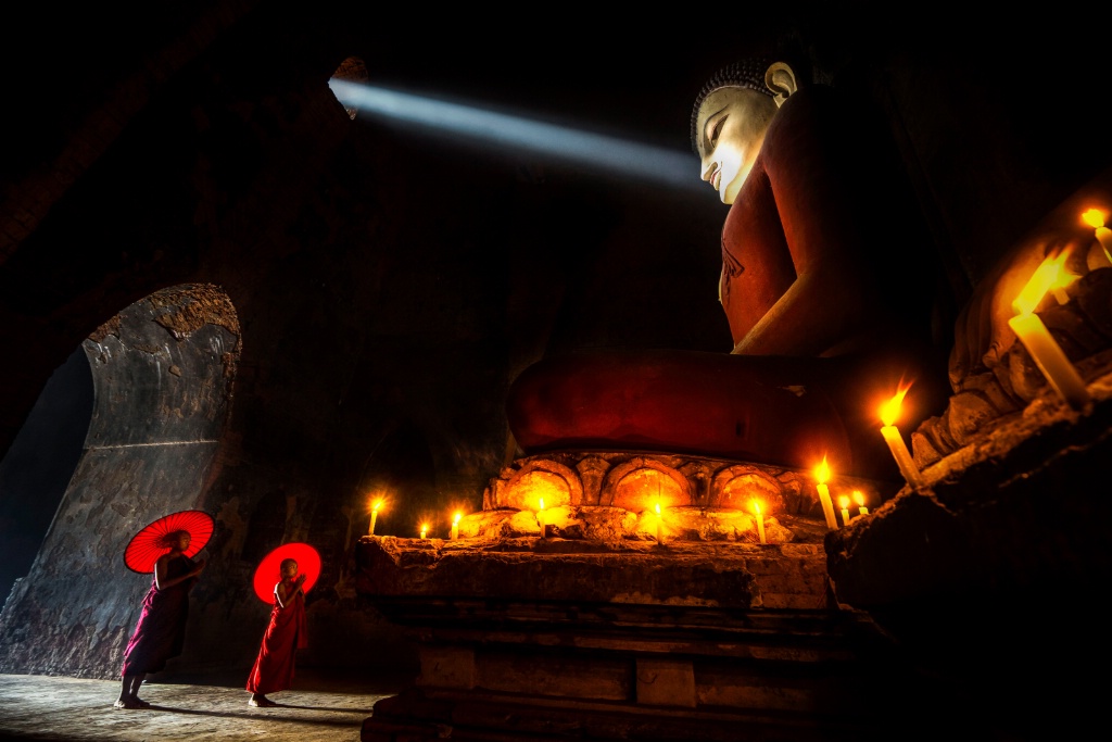 Light on the face of Buddha statue