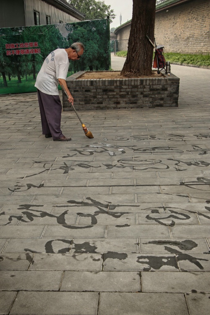 Practicing His Calligraphy in Xian, China