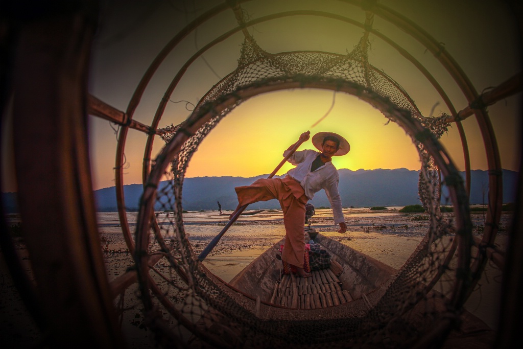 Fishing net and fisherman