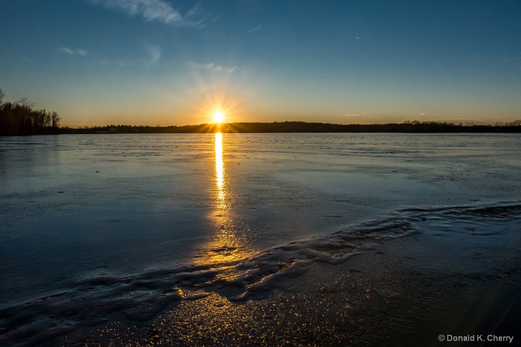 Sunset on Frozen Lake
