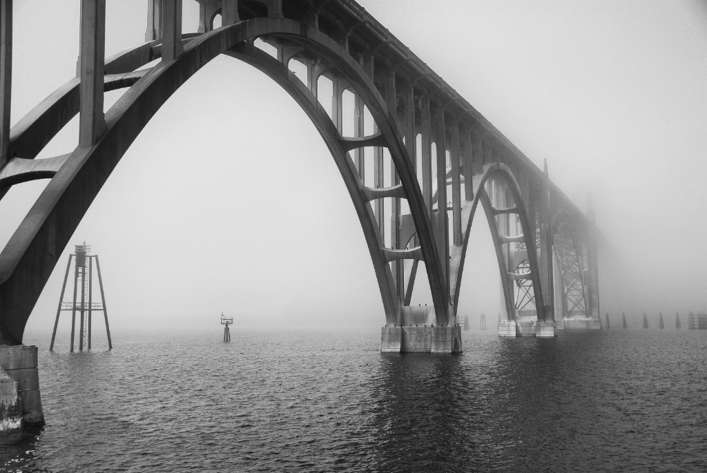A bridge leading into a fog bank on the Oregon coa