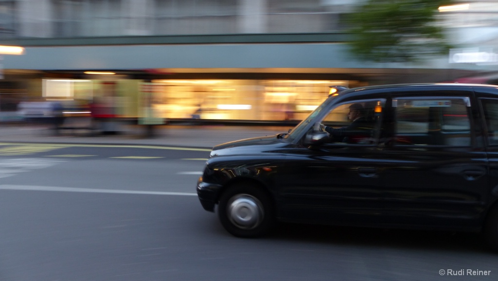 Taxi at speed, London