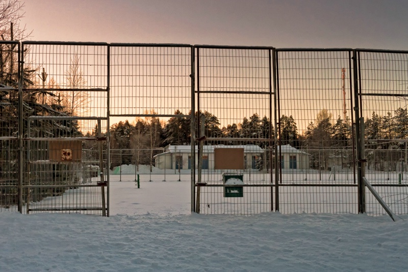 Gate To The Snow Covered Tennis Court