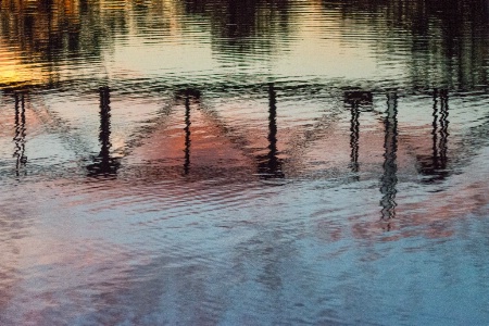 Sunset Reflection At The RR Bridge