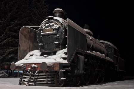 Old Steam Engine Covered With Snow