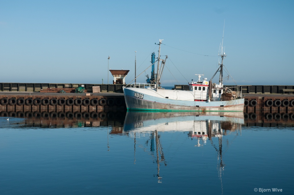 Fishing boat reflection