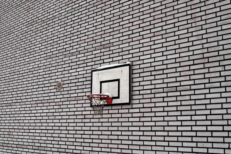 Basketball Hoop On A Brick Wall