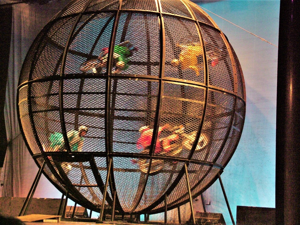 Globe with high speed cyclists